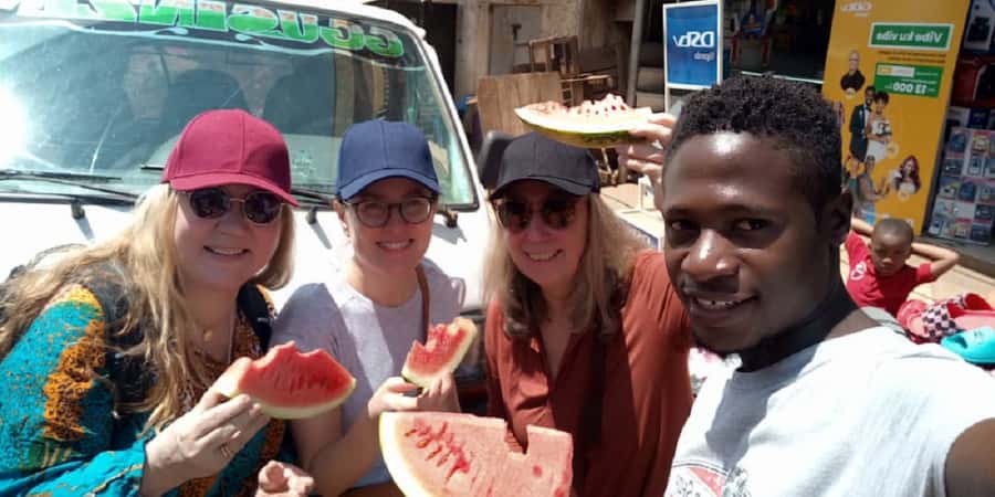 Kampala: Three-Hour Food Tour - Fruit and snacks inside Kamwokya Market